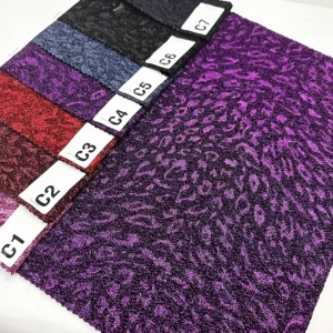 Leopard Relief on Metallic Knitted Jacquard Fabric